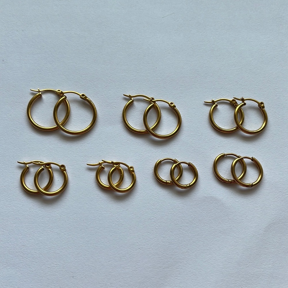 7 pairs gold hoop earrings